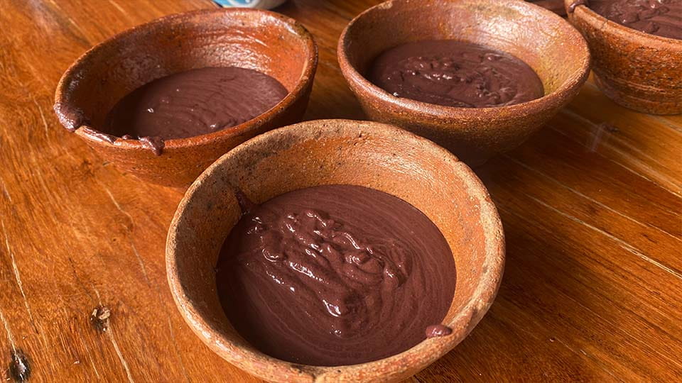 3 bowls with melted chocolate